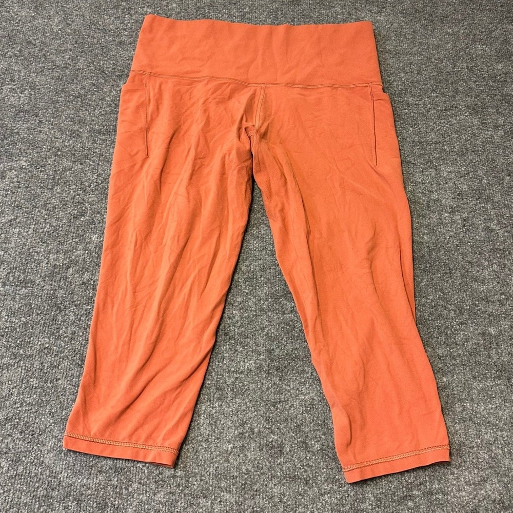 Athleta Capri Womens Size 1X Orange Salutation Stash Pocket High Rise Yoga Pants